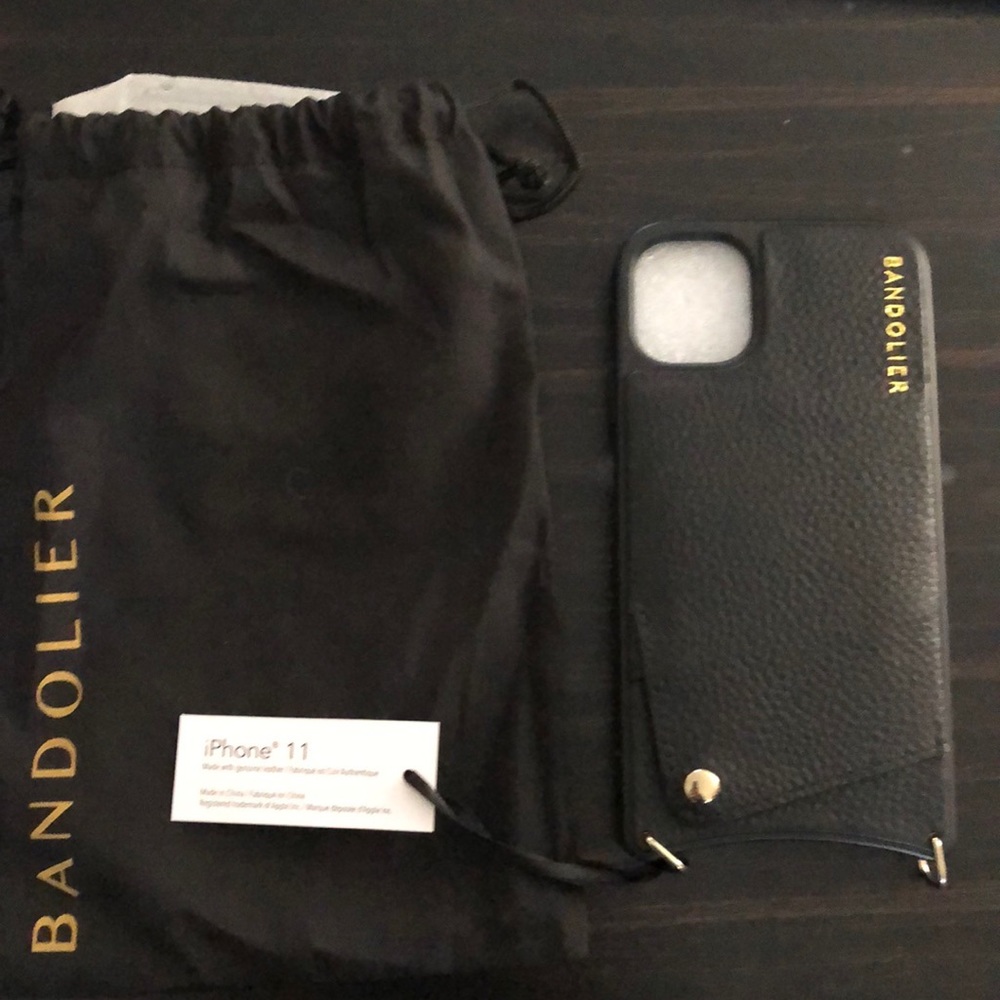 Bandolier black/gold case; never used; iPhone 11